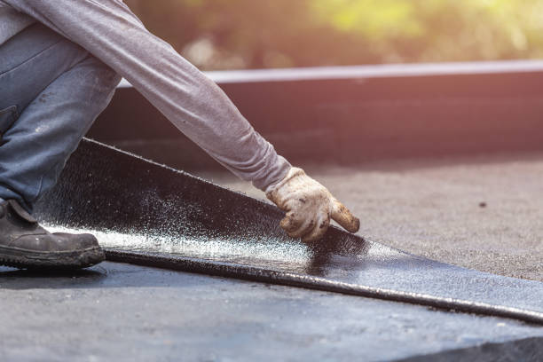 Professional Waterproofing technician working in Coloma, MI